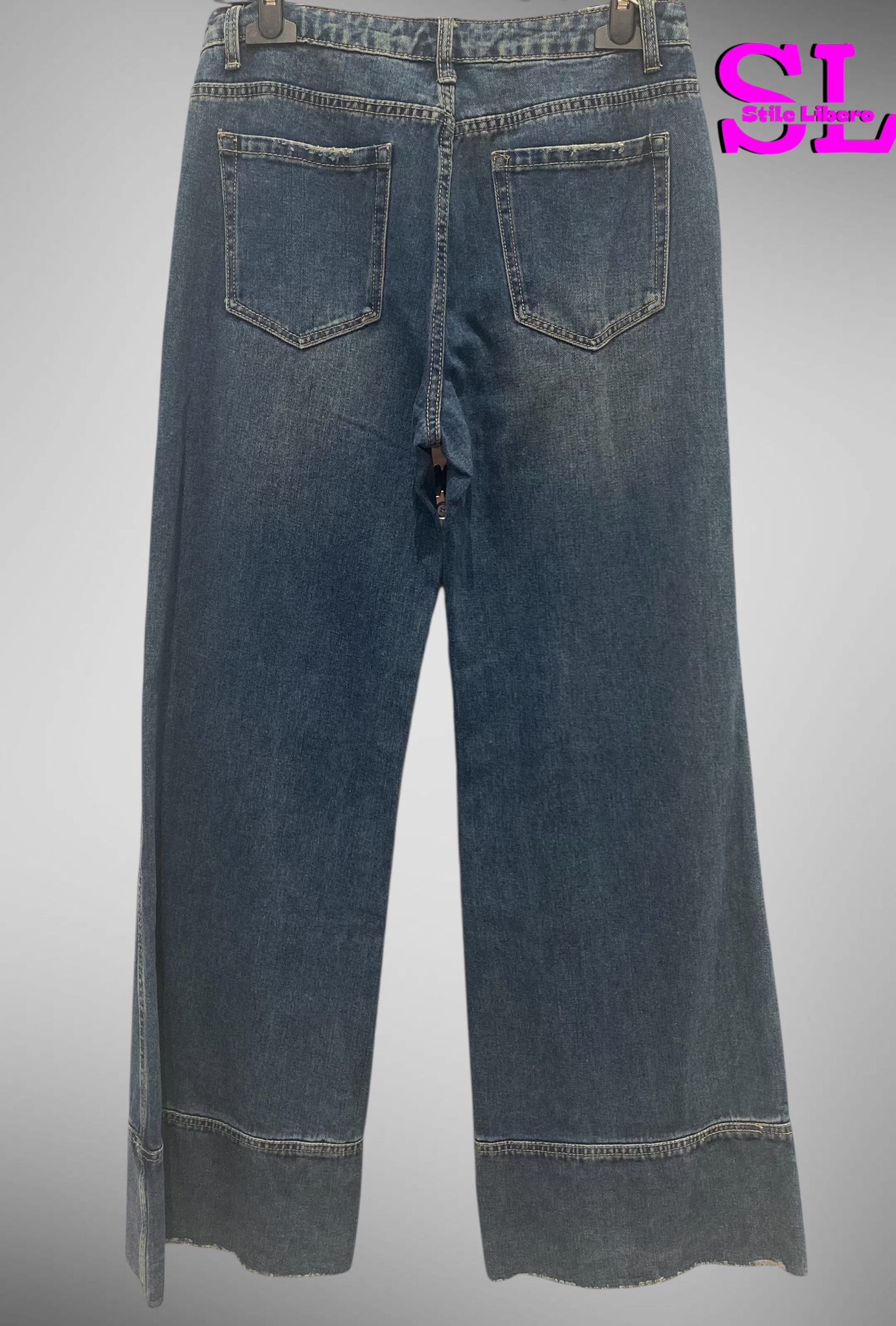 Jeans zampa risvolto